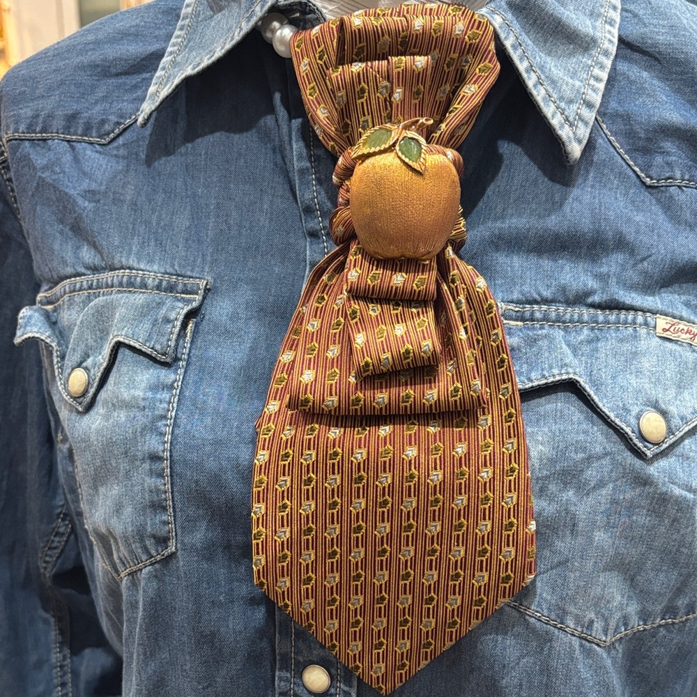 Chic Brown Patterned Scarf with Gold Accents